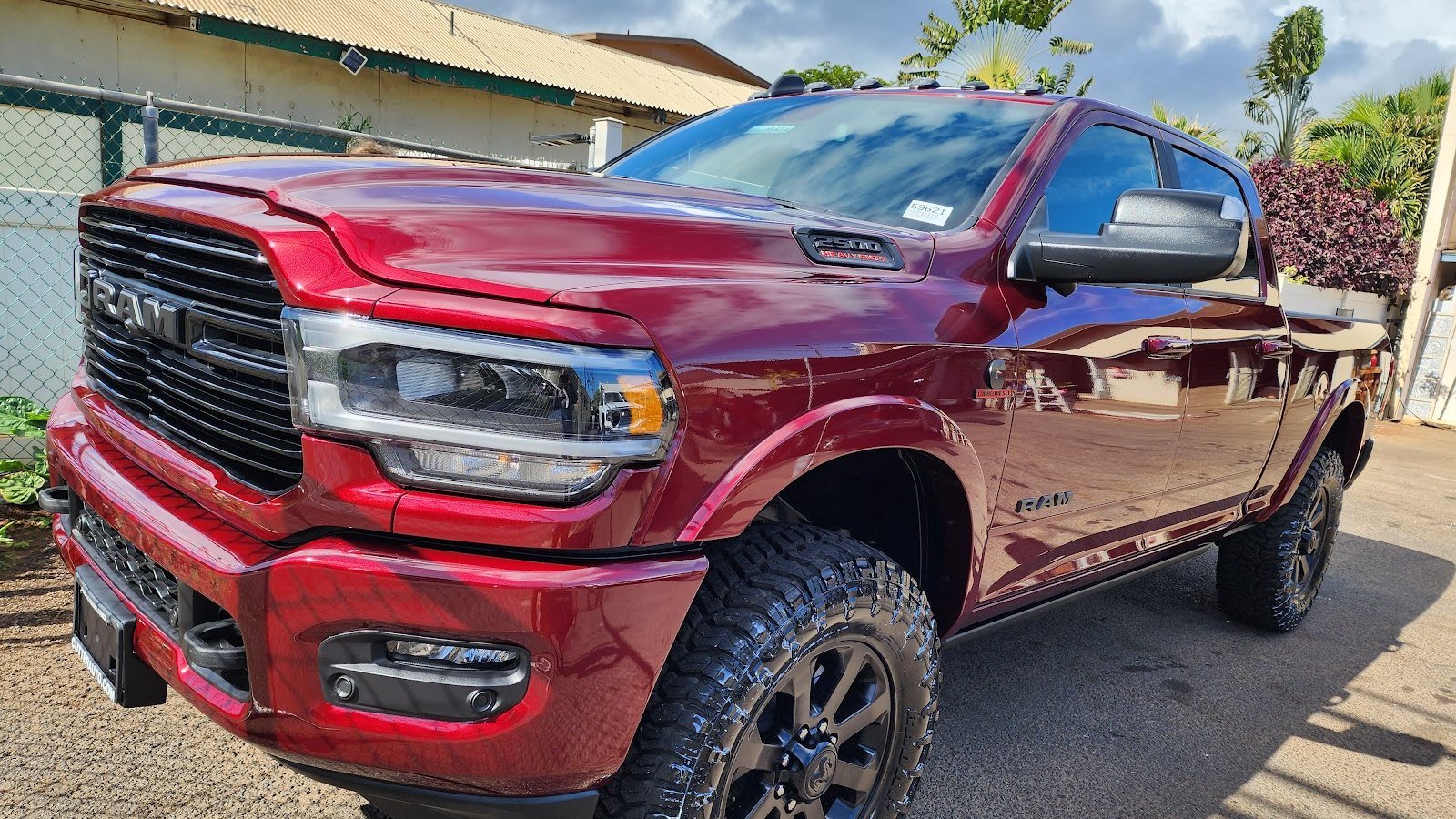 Freshly detailed red pickup truck with a deep gloss finish