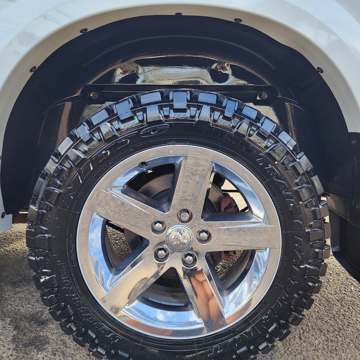 Close-up of a polished wheel and dressed tire